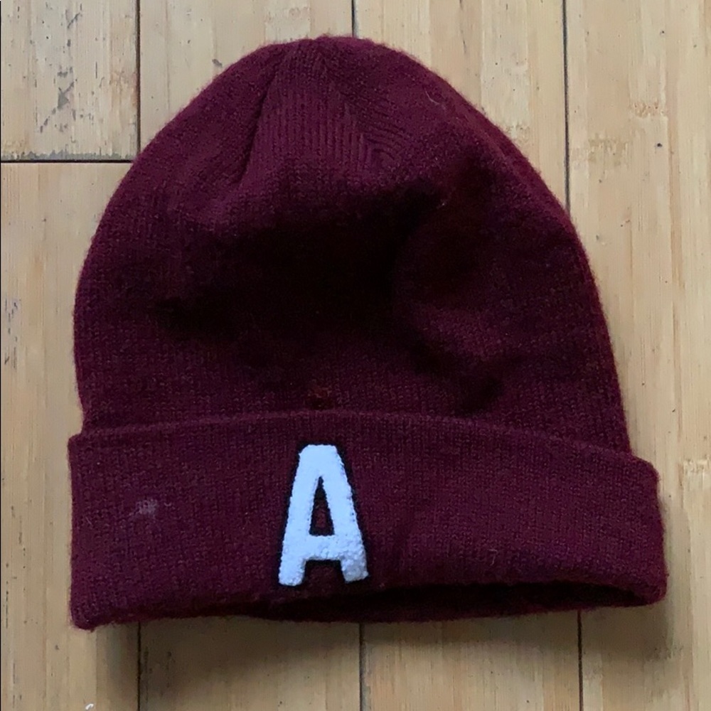 Burgundy beanie with a patch of the letter A